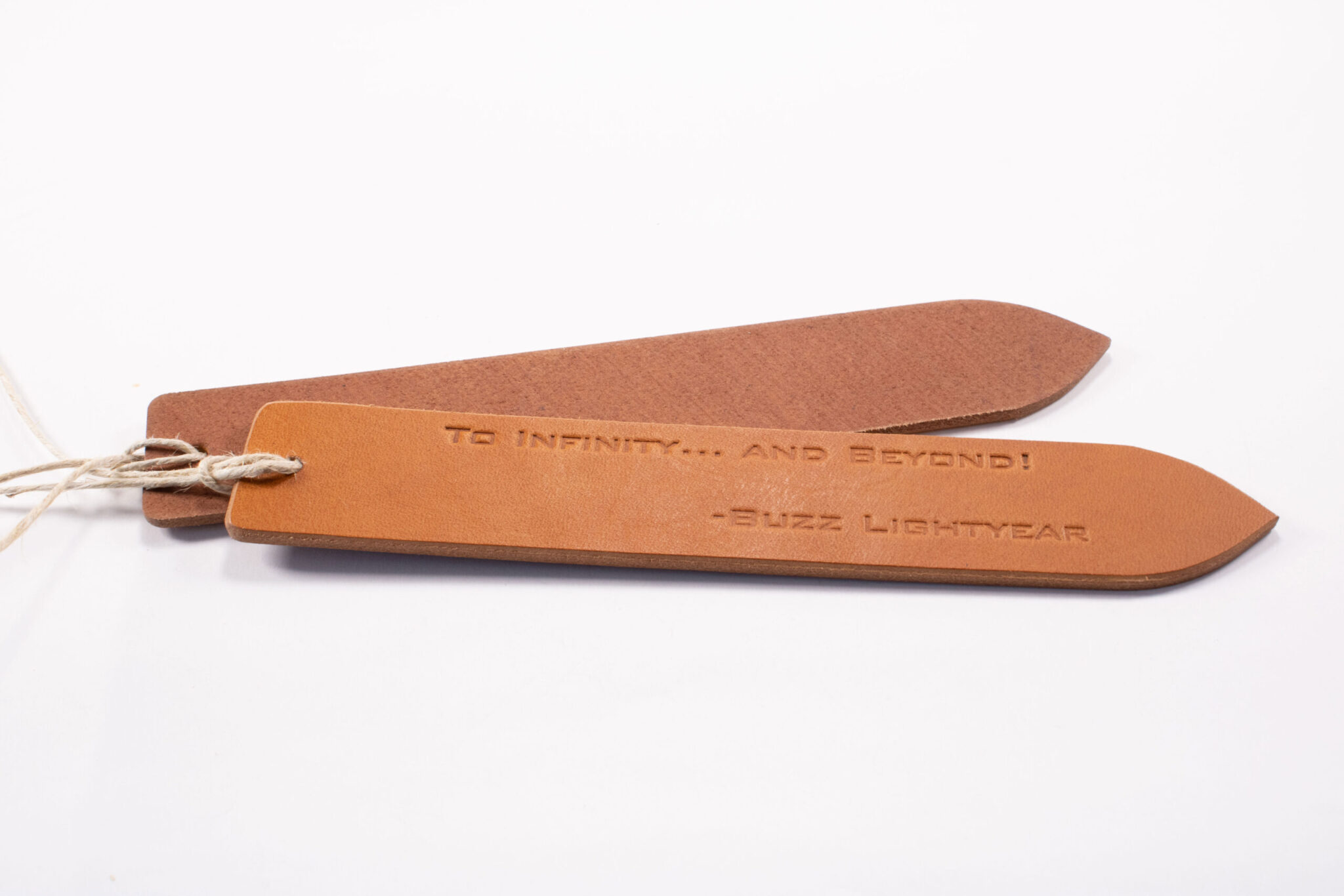 Product image of FredFloris leather bookmark with quotes, heat pressed without gold foil