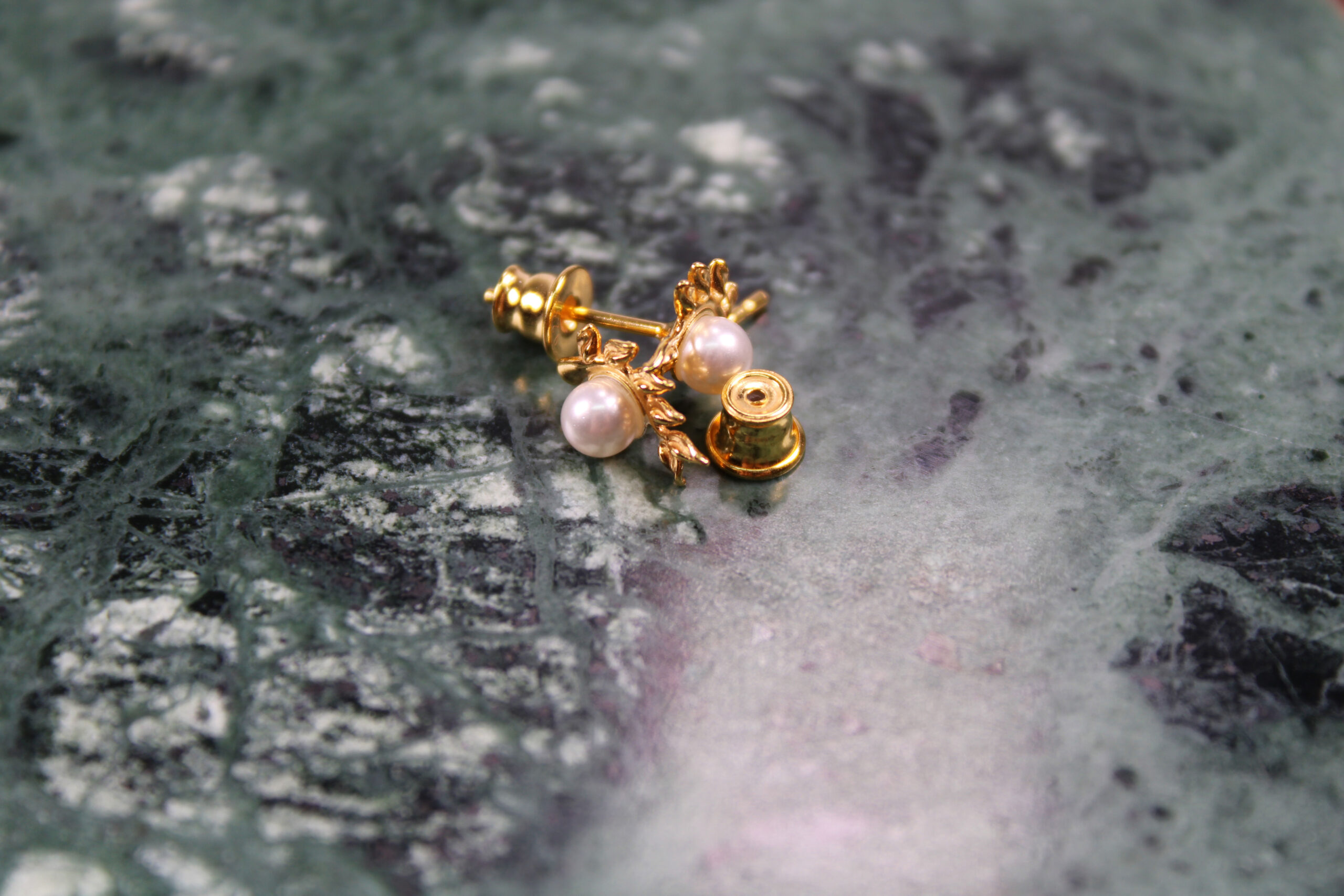 Product image of FredFloris small stud gold plated silver pearl earrings