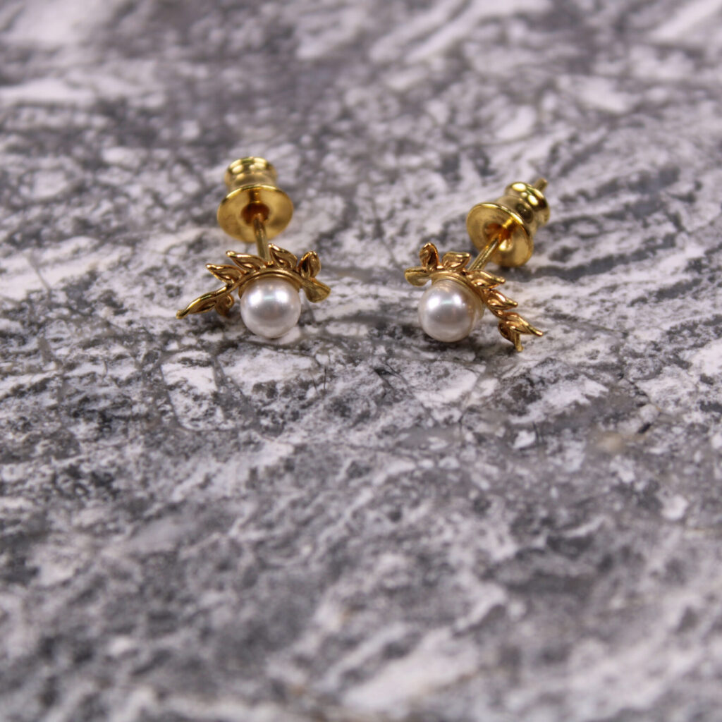 Product image of FredFloris small stud gold plated silver pearl earrings