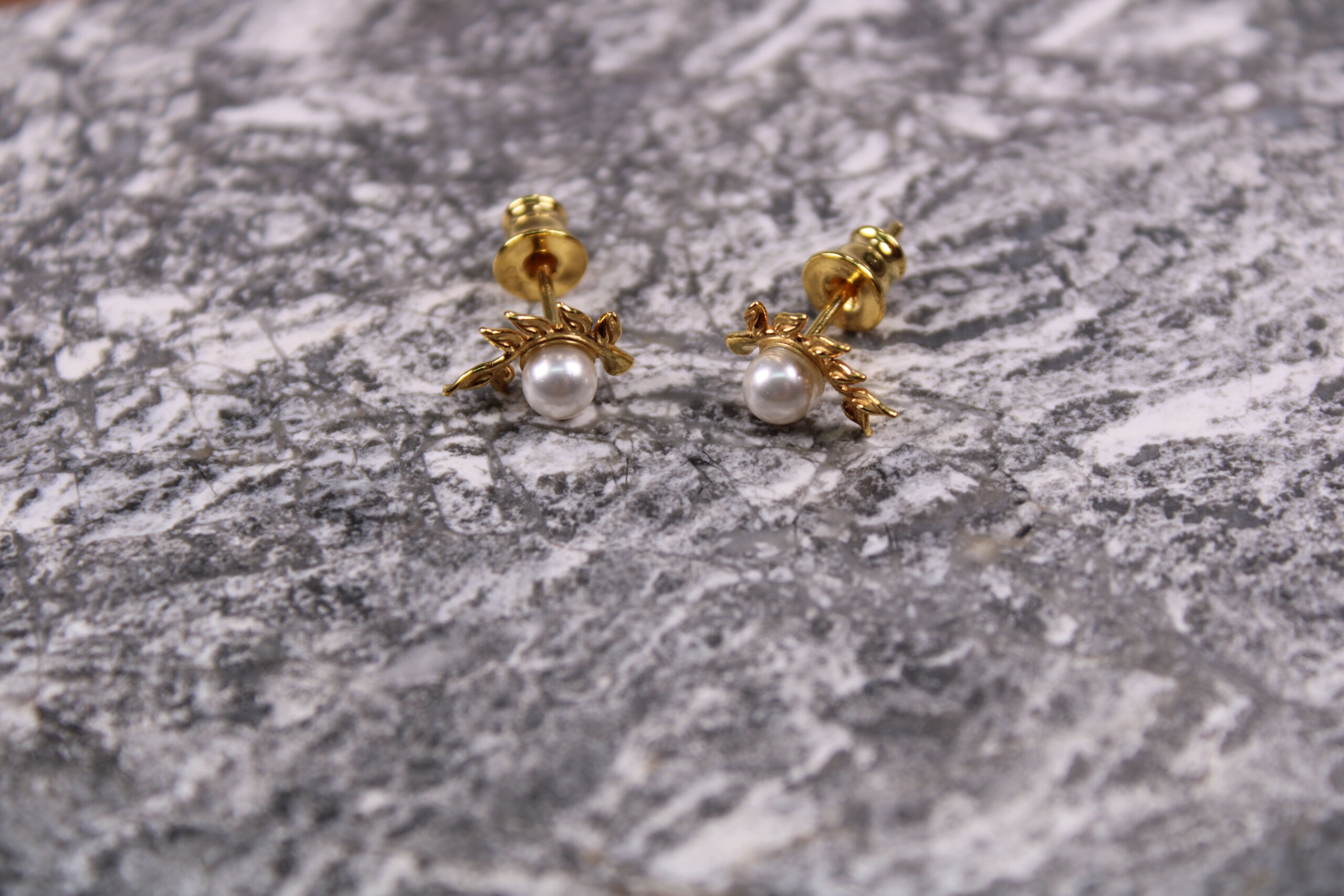 Product image of FredFloris small stud gold plated silver pearl earrings