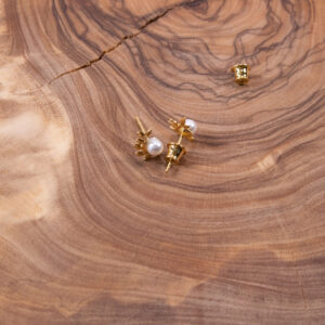 Product image of FredFloris small stud gold plated silver pearl earrings