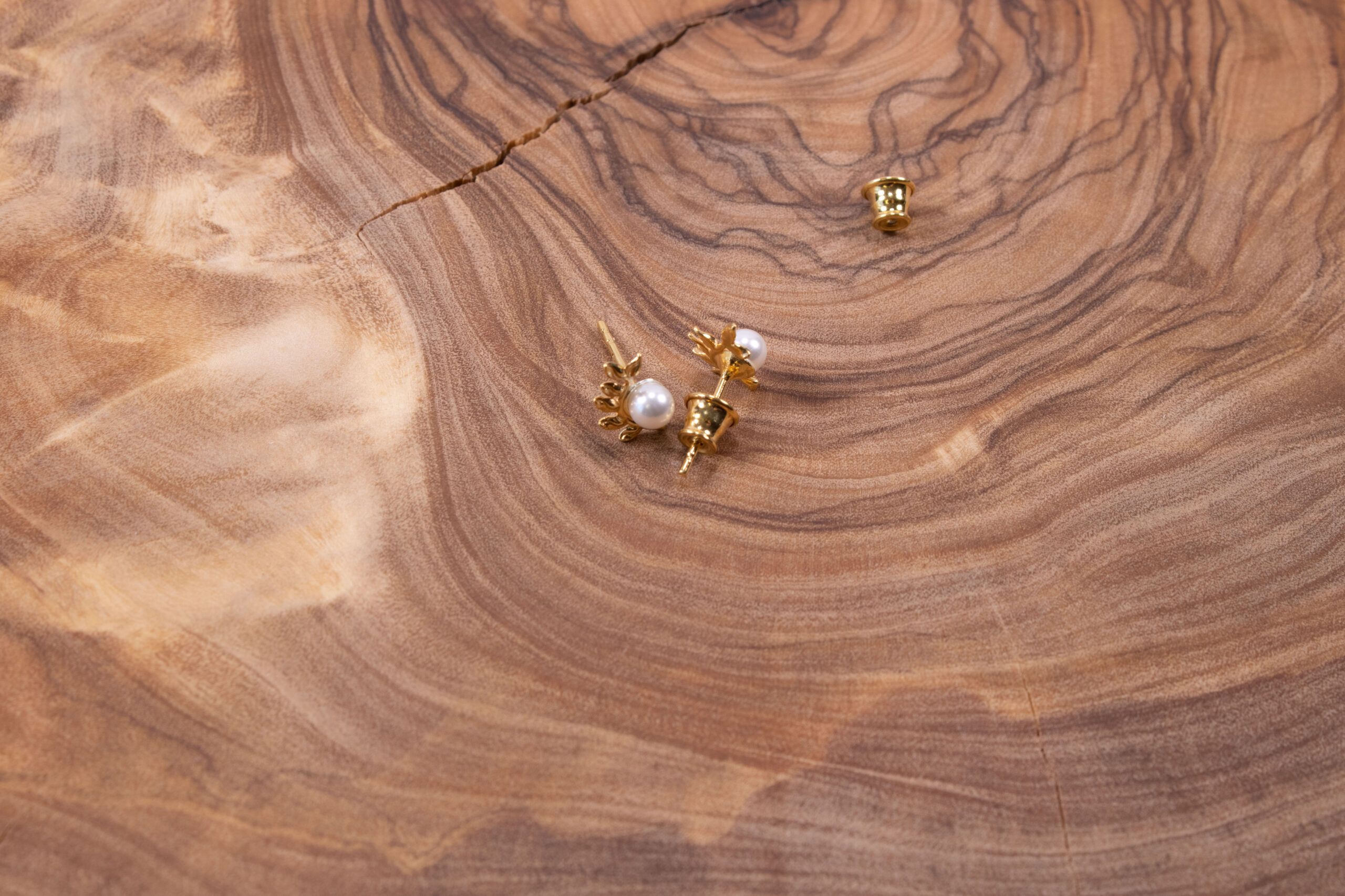 Product image of FredFloris small stud gold plated silver pearl earrings