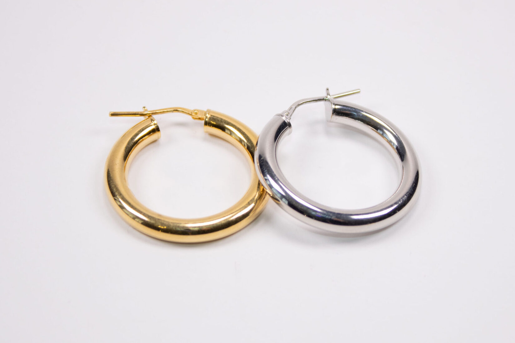 Product image of FredFloris thick & chunky, gold & platinum plated silver hoop earrings