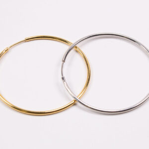 Product image of FredFloris large round hoop gold and silver earrings