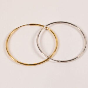 Product image of FredFloris large round hoop gold and silver earrings